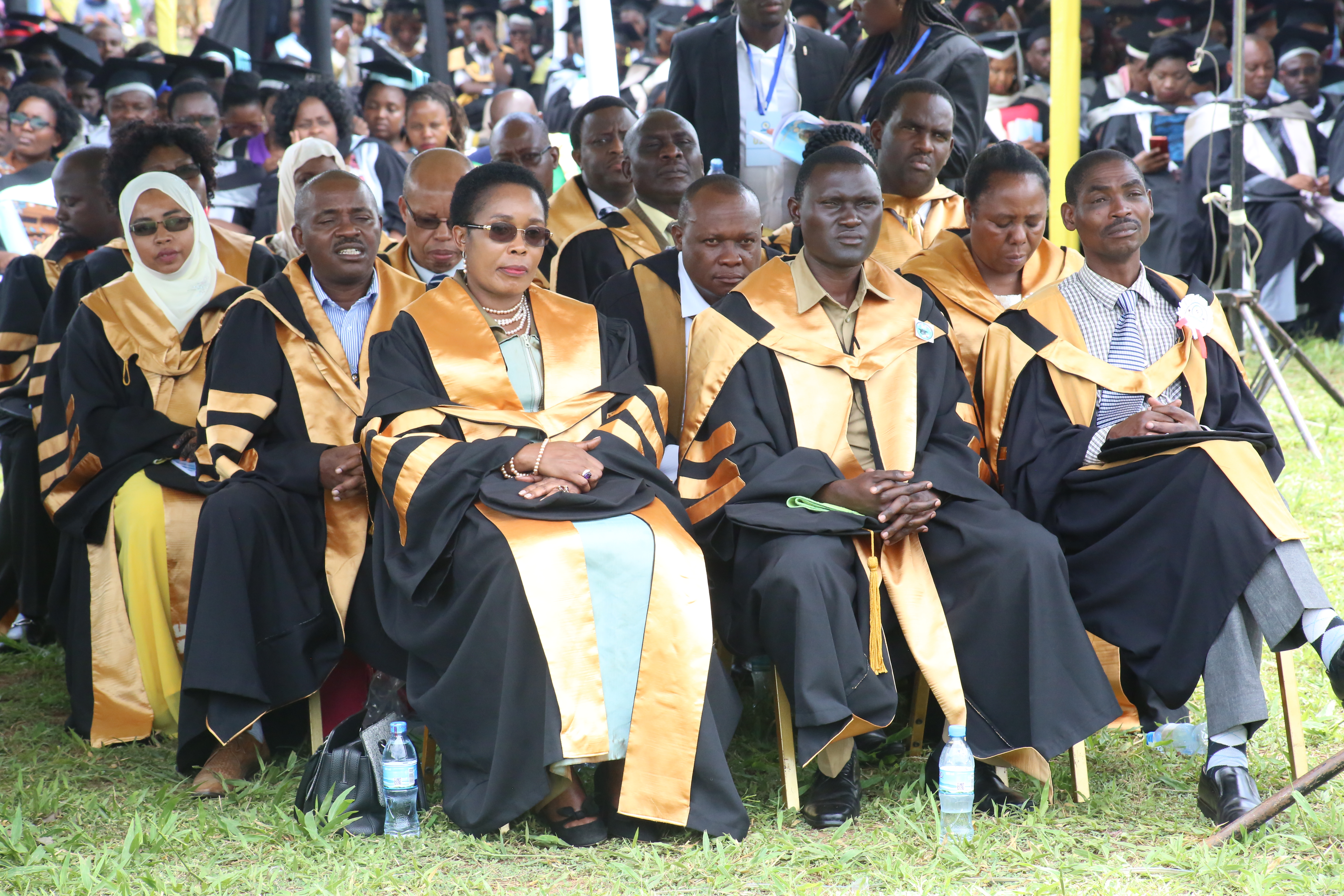 PhD graduates listening to various speeches during the 37th graduation ceremonyof the Open University of Tanzania held on 28th September 2019 at Bungo, Kibaha